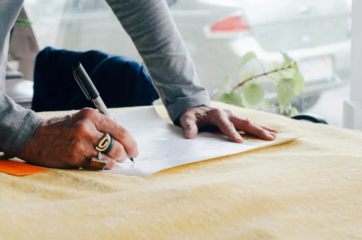Reviewing a policy with pen in hand