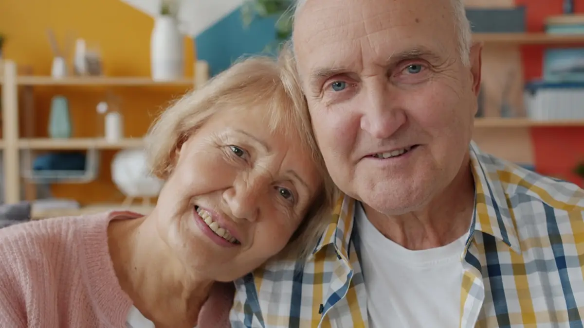 Couple in their forties at home
